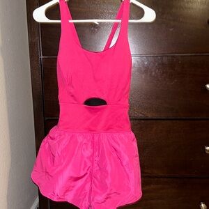 bright pink one piece workout suit
